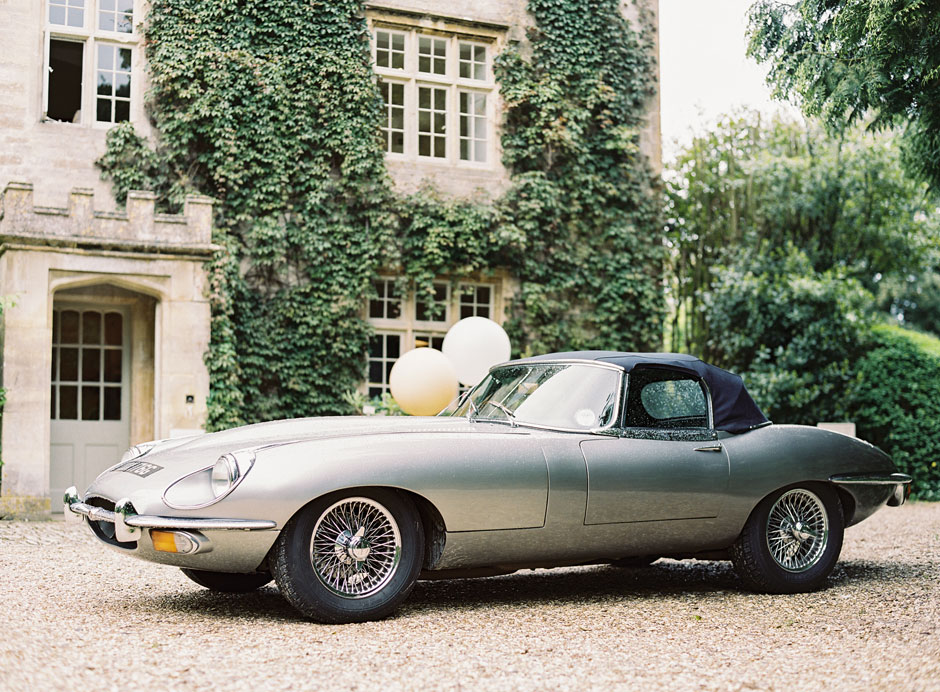 Wedding at Barnsley House with a Jaguar e Type wedding car